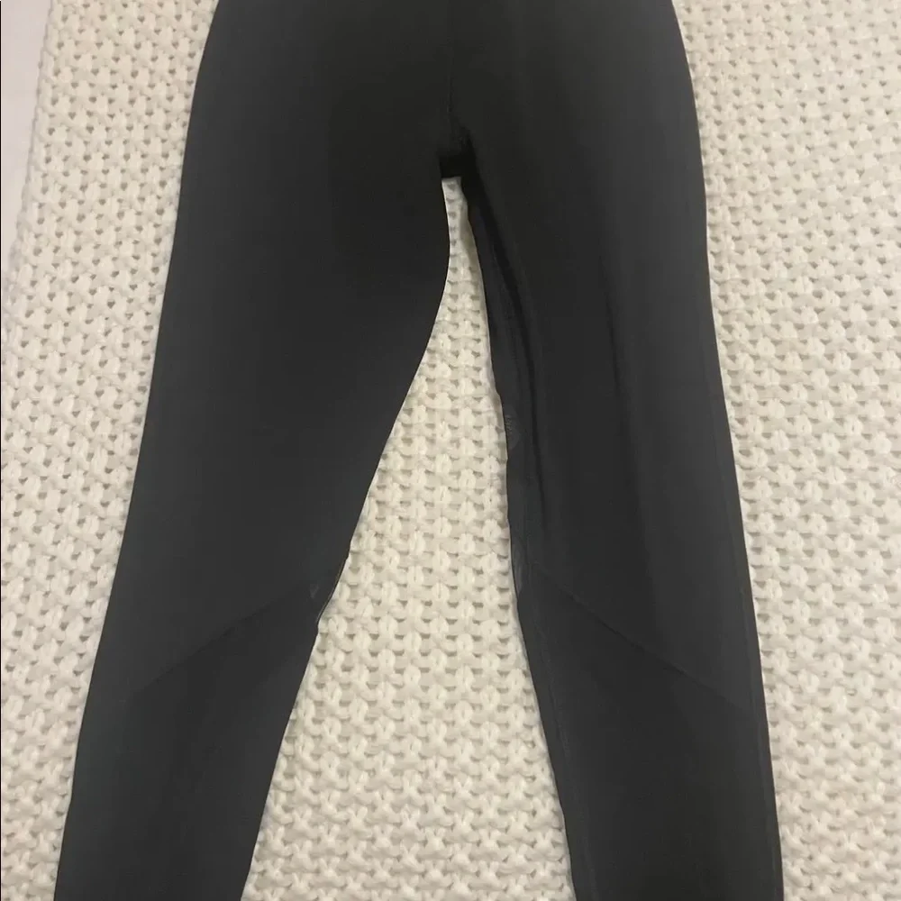 Black Tasc leggings! Cute mesh detail. Great condition! - Picture 4 of 6